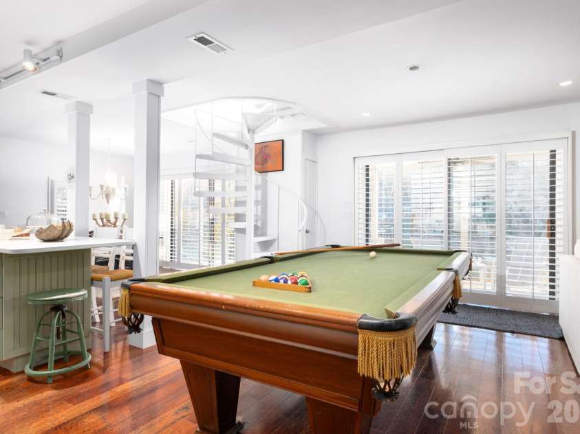 183 Blarney Road, Lake Lure, NC 28746.  MLS# CAR4326369, YatesRealty ID 49285. Open Floor Plan with Pool Table in Lower Level
