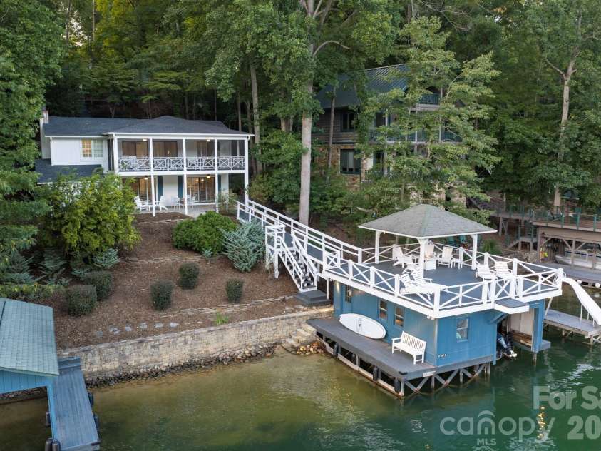 183 Blarney Road, Lake Lure, NC 28746.  MLS# CAR4326369, YatesRealty ID 49285. Property Features an Additional Third Covered Boat Slip
