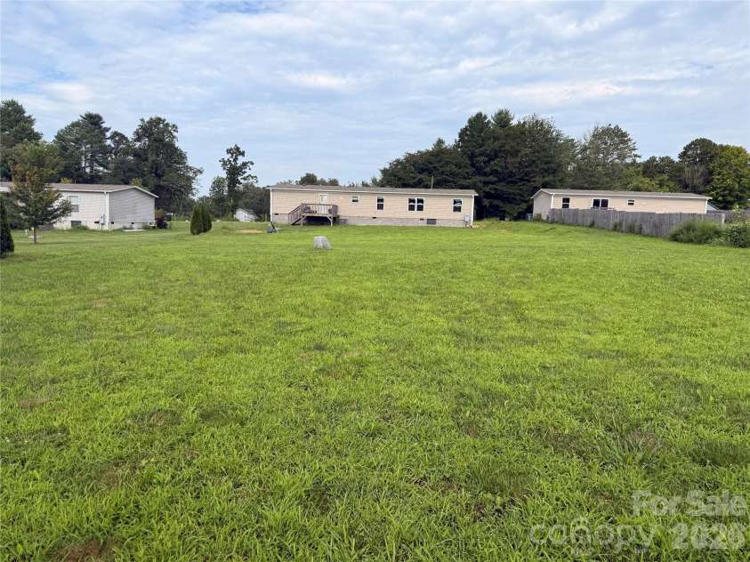 37 Mossy Brook Trail, Hendersonville, NC 28792.  MLS# CAR4418383, YatesRealty ID 49287. Back Yard