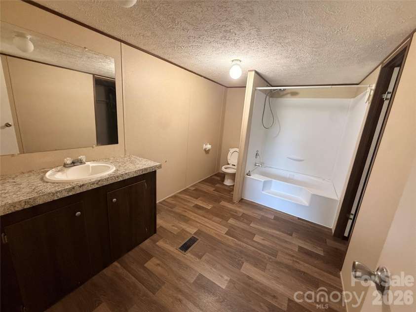 37 Mossy Brook Trail, Hendersonville, NC 28792.  MLS# CAR4418383, YatesRealty ID 49287. Master Bathroom