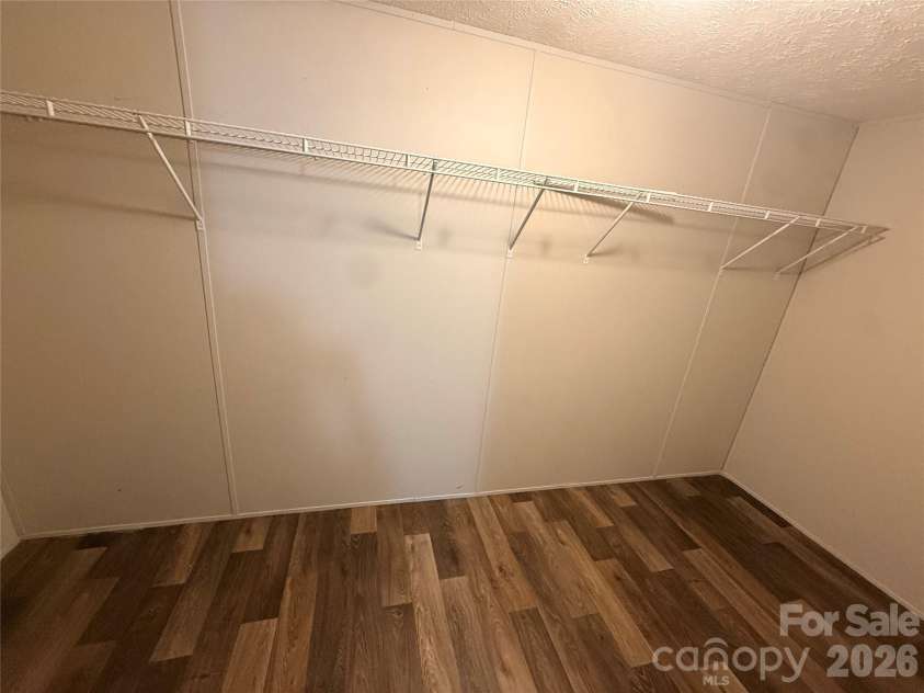 37 Mossy Brook Trail, Hendersonville, NC 28792.  MLS# CAR4418383, YatesRealty ID 49287. Master Walk-in Closet