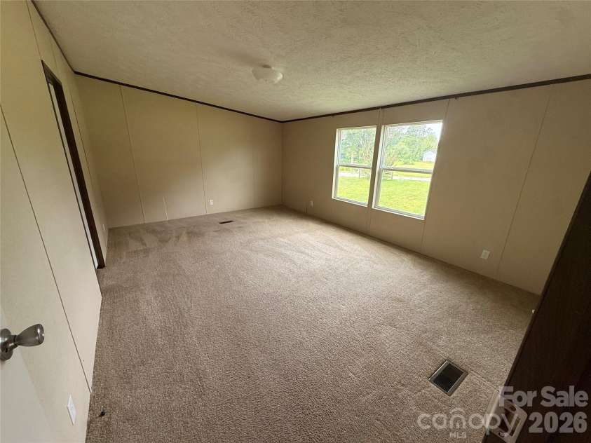 37 Mossy Brook Trail, Hendersonville, NC 28792.  MLS# CAR4418383, YatesRealty ID 49287. Primary Bedroom