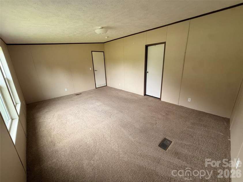 37 Mossy Brook Trail, Hendersonville, NC 28792.  MLS# CAR4418383, YatesRealty ID 49287. Primary Bedroom