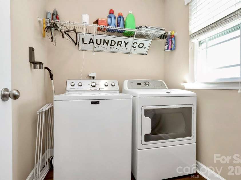 5519 Hubbard Point Drive, Charlotte, NC 28269.  MLS# CAR4419851, YatesRealty ID 49289. Upper Laundry Room