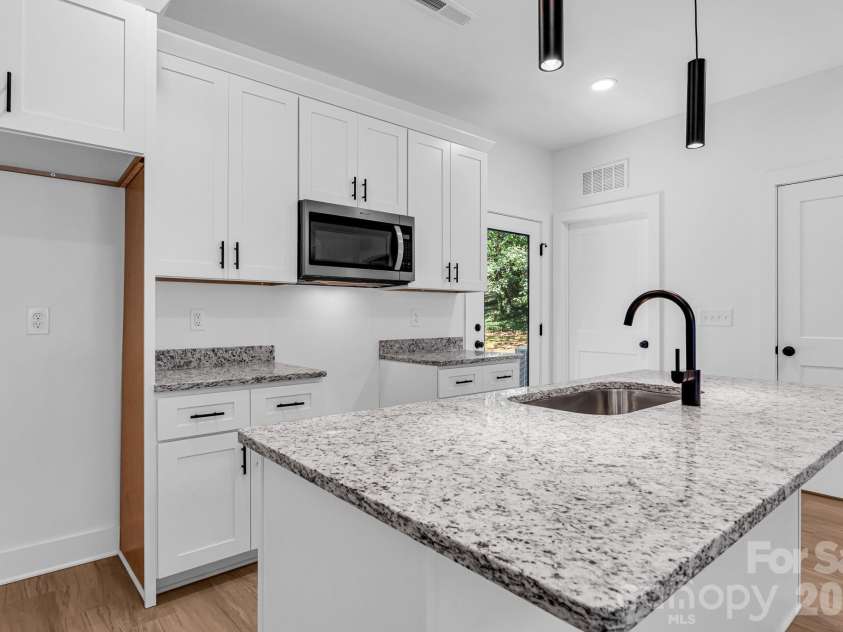 114 Yadkin Avenue, Spencer, NC 28159.  MLS# CAR4422284, YatesRealty ID 49299. 