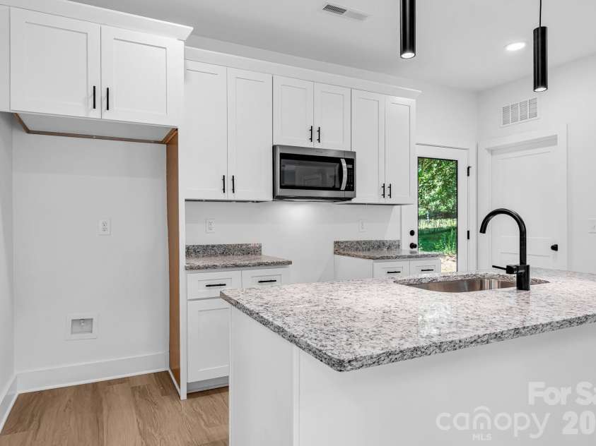 112 Yadkin Avenue, Spencer, NC 28159.  MLS# CAR4422285, YatesRealty ID 49300. 