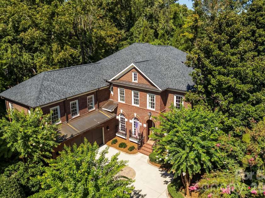 8928 Heydon Hall Circle, Charlotte, NC 28210.  MLS# CAR4297775, YatesRealty ID 49323. Arial view of a all brick home.