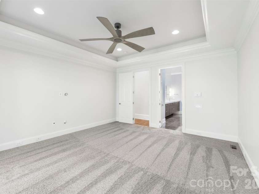 8928 Heydon Hall Circle, Charlotte, NC 28210.  MLS# CAR4297775, YatesRealty ID 49323. First floor primary bedroom