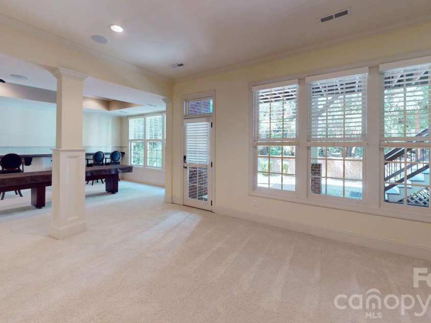 8928 Heydon Hall Circle, Charlotte, NC 28210.  MLS# CAR4297775, YatesRealty ID 49323. Fully finished basement with bedroom, full bath and extra storage