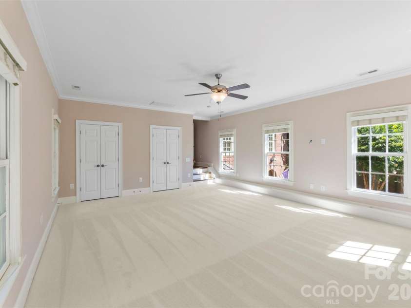 8928 Heydon Hall Circle, Charlotte, NC 28210.  MLS# CAR4297775, YatesRealty ID 49323. Oversized bedroom above garage with easy access to renovated full bath