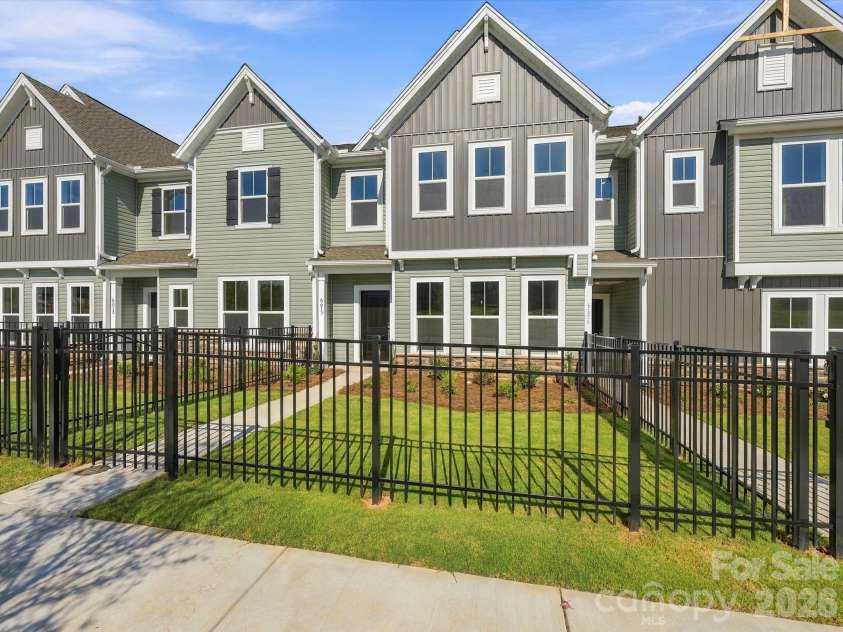 6617 Fire Lily Lane, Charlotte, NC 28216.  MLS# CAR4422331, YatesRealty ID 49324. Exterior Elevation