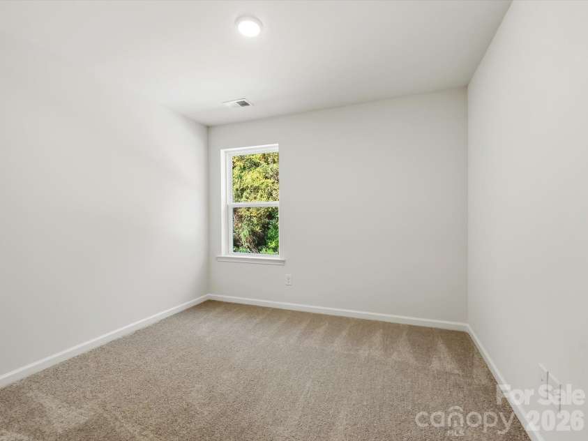 6617 Fire Lily Lane, Charlotte, NC 28216.  MLS# CAR4422331, YatesRealty ID 49324. Secondary Bedroom