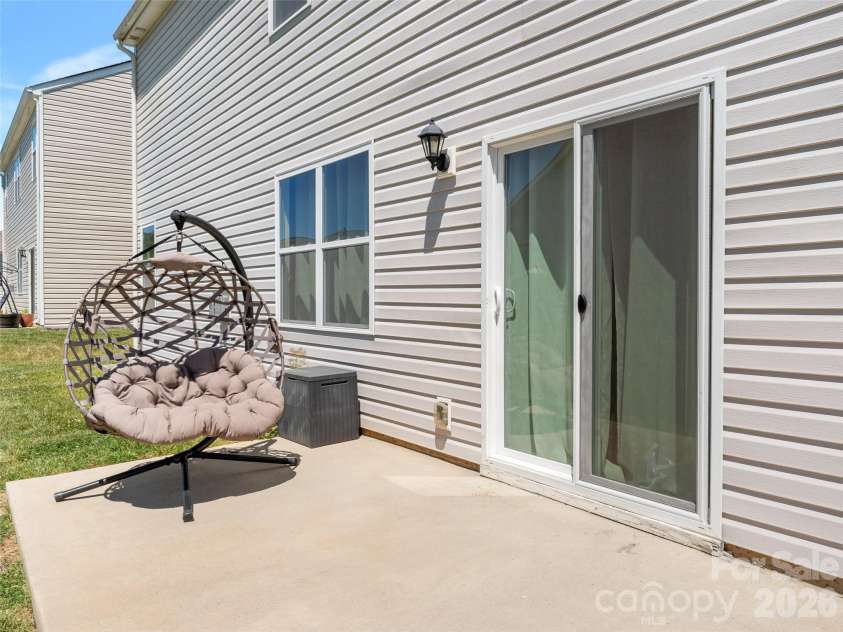 302 woodnettle Lane, Arden, NC 28704.  MLS# CAR4421462, YatesRealty ID 49330. Back patio