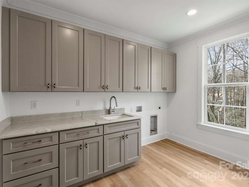 5026 Ohm Lane, Charlotte, NC 28270.  MLS# CAR4223780, YatesRealty ID 4934. Laundry Room