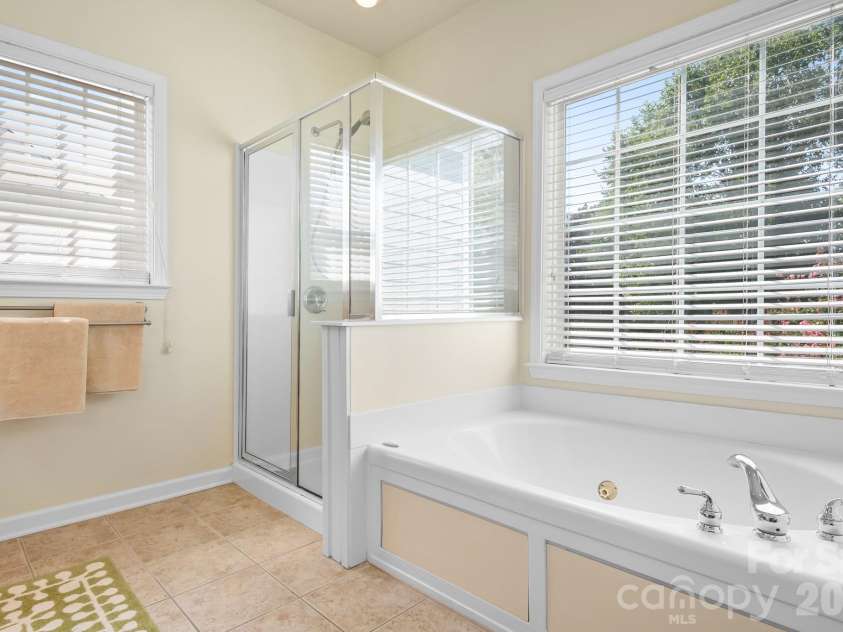 8606 Camberly Road, Huntersville, NC 28078.  MLS# CAR4404900, YatesRealty ID 49341. Primary bath
