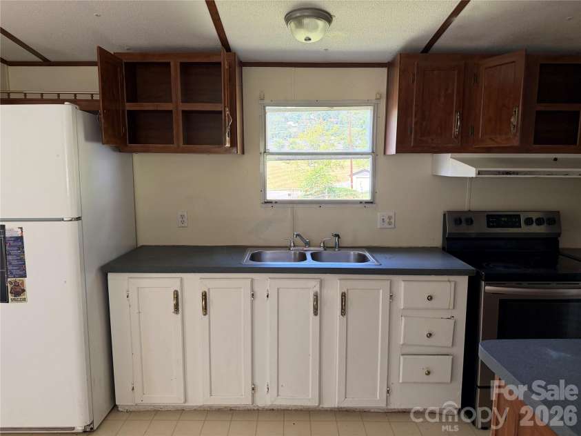 18 Wheeler Hills Road, Burnsville, NC 28714.  MLS# CAR4422288, YatesRealty ID 49343. 