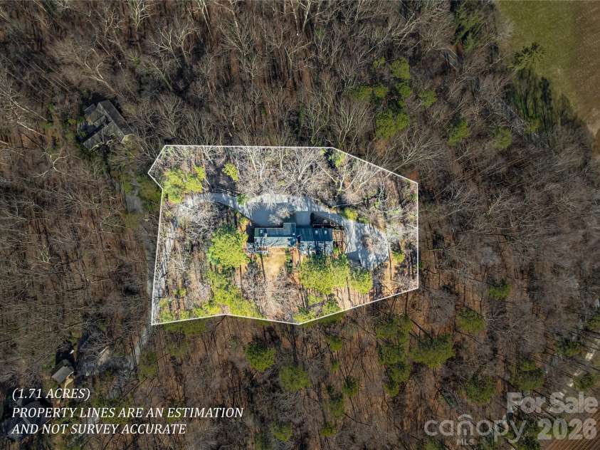 566 Canebrake Road, Tryon, NC 28782.  MLS# CAR4422272, YatesRealty ID 49348. 