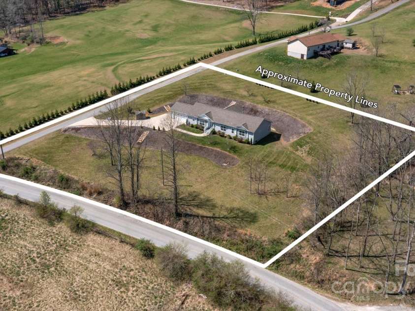 52 Stone Ridge Trail, Mills River, NC 28759.  MLS# CAR4239861, YatesRealty ID 4935. Almost 2 usable acres w/ views!