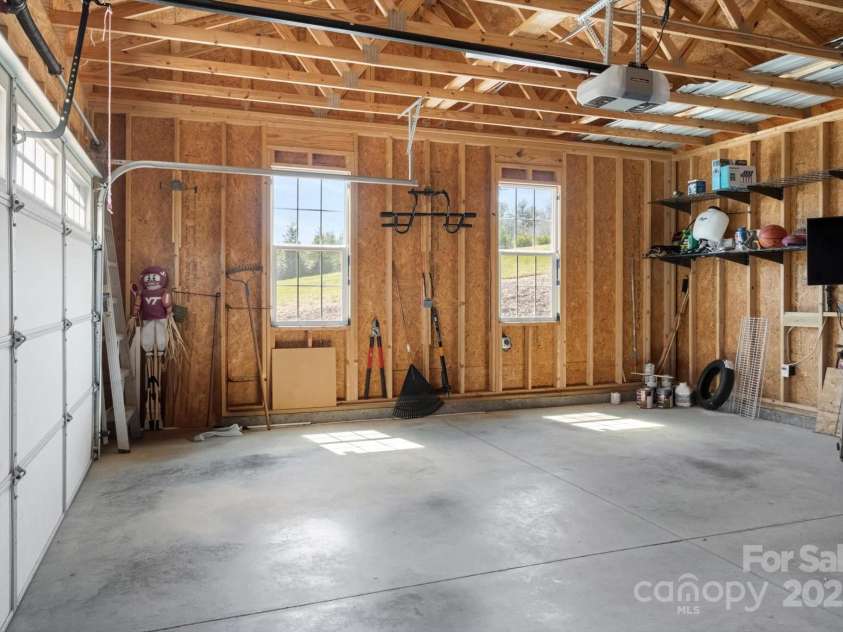 52 Stone Ridge Trail, Mills River, NC 28759.  MLS# CAR4239861, YatesRealty ID 4935. Attached 2-car garage