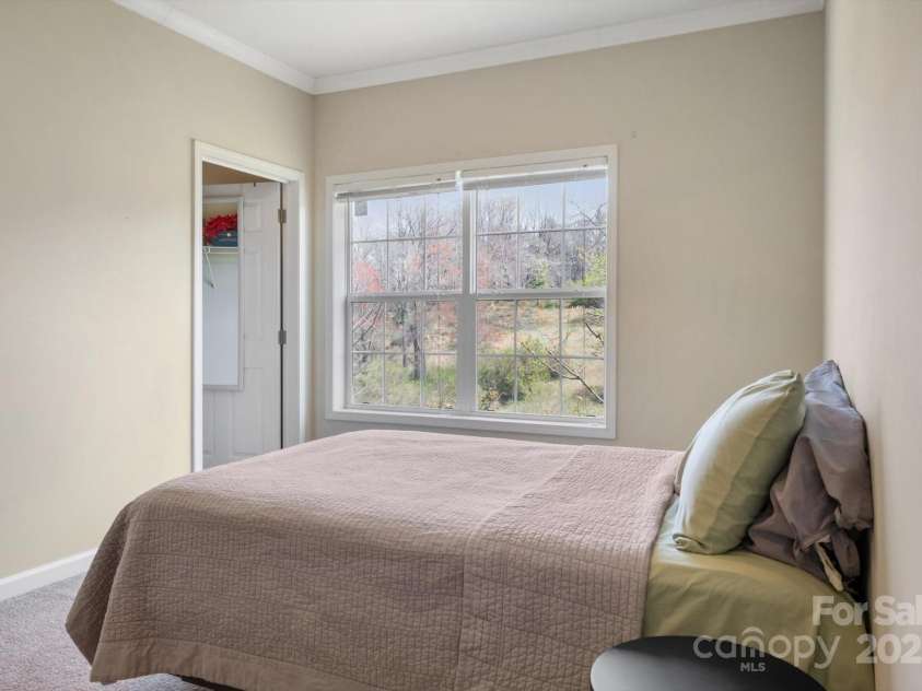 52 Stone Ridge Trail, Mills River, NC 28759.  MLS# CAR4239861, YatesRealty ID 4935. Bedroom #2 with extra large closet & mountain views