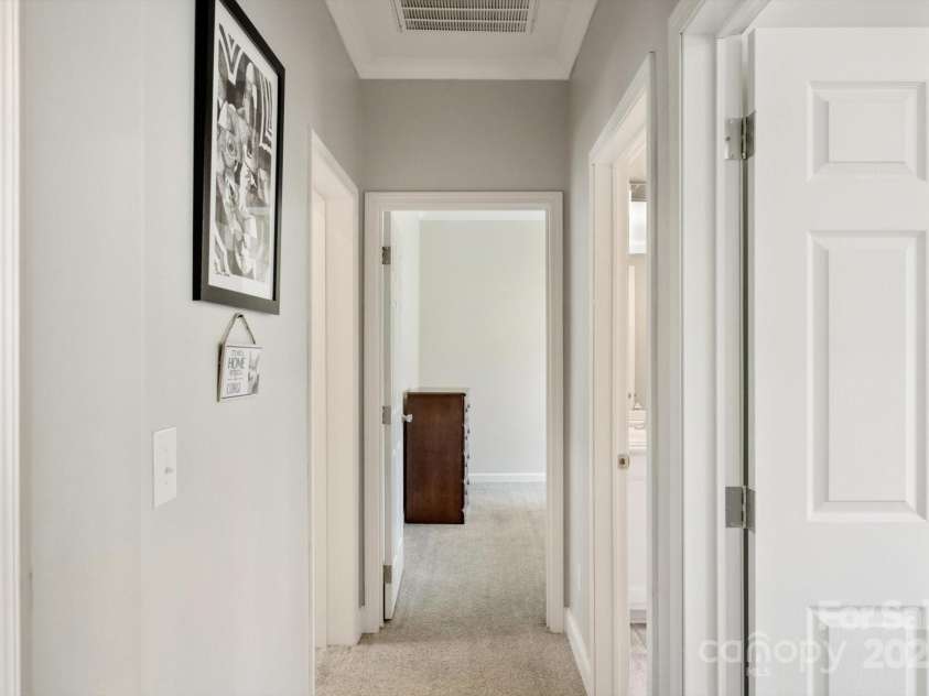 52 Stone Ridge Trail, Mills River, NC 28759.  MLS# CAR4239861, YatesRealty ID 4935. Hallway leading to bedrooms & hall bath