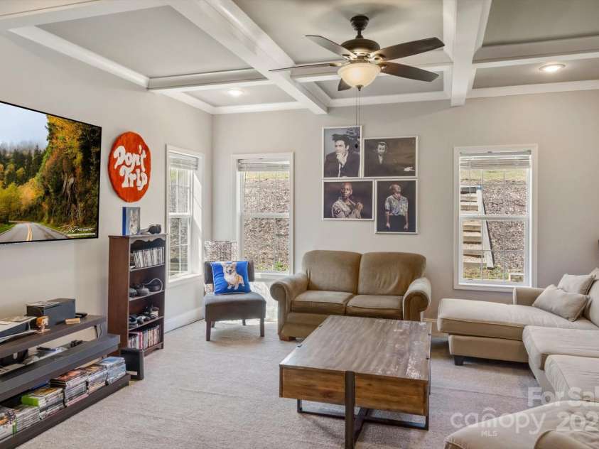 52 Stone Ridge Trail, Mills River, NC 28759.  MLS# CAR4239861, YatesRealty ID 4935. Large den with coffered ceilings