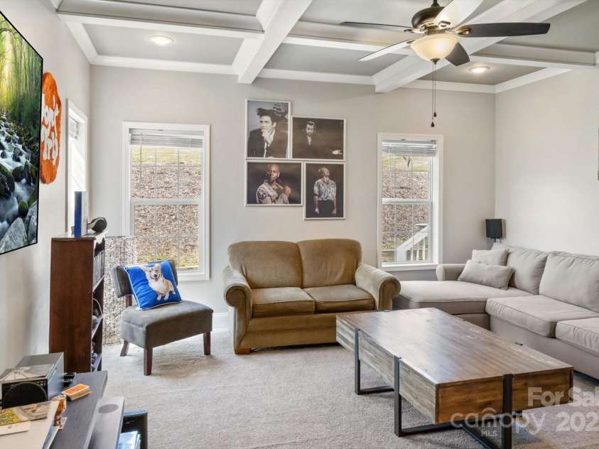 52 Stone Ridge Trail, Mills River, NC 28759.  MLS# CAR4239861, YatesRealty ID 4935. Large den with coffered ceilings