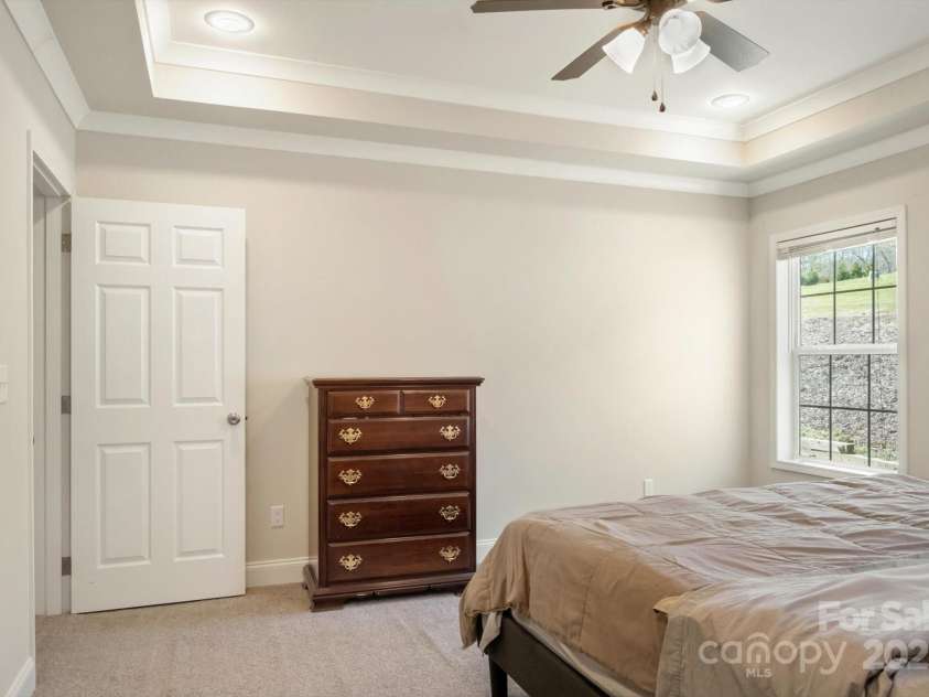 52 Stone Ridge Trail, Mills River, NC 28759.  MLS# CAR4239861, YatesRealty ID 4935. Primary Bedroom with large ensuite bathroom