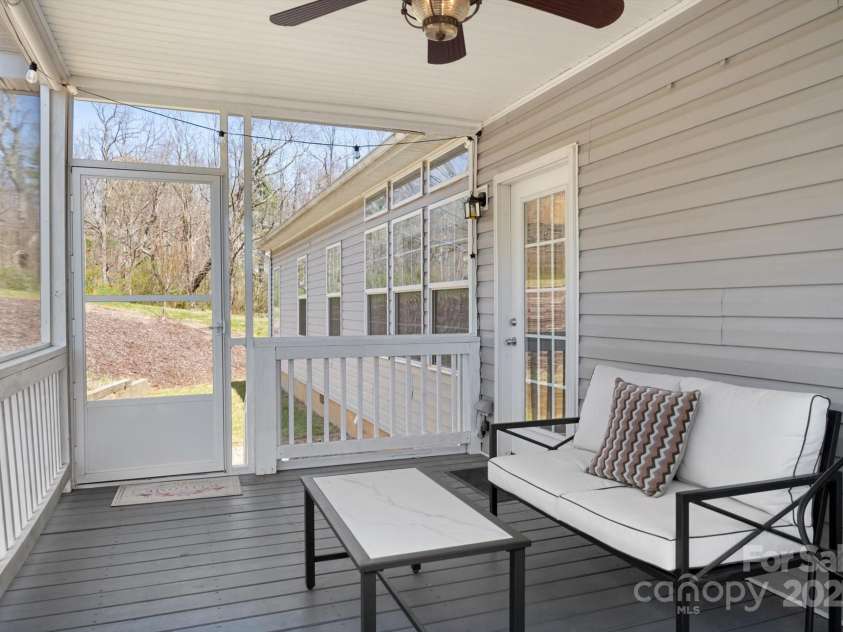 52 Stone Ridge Trail, Mills River, NC 28759.  MLS# CAR4239861, YatesRealty ID 4935. Screened in back porch