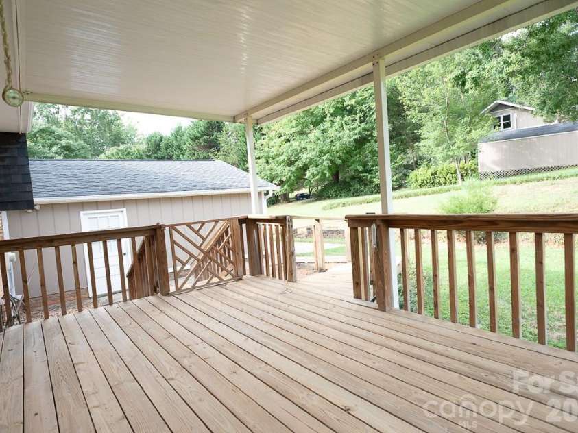 3401 Tracelake Drive, Matthews, NC 28105.  MLS# CAR4417359, YatesRealty ID 49352. Deck for a morning coffee