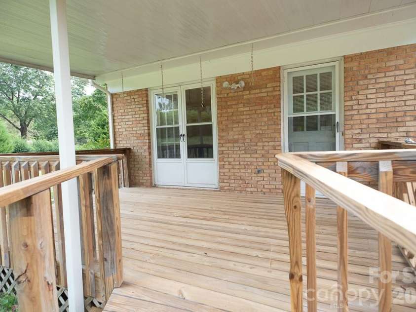 3401 Tracelake Drive, Matthews, NC 28105.  MLS# CAR4417359, YatesRealty ID 49352. Deck is great for entertaining