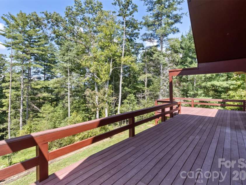 16 Spruce Way, Fairview, NC 28730.  MLS# CAR4421539, YatesRealty ID 49354. Look at the deck space available for entertaining!