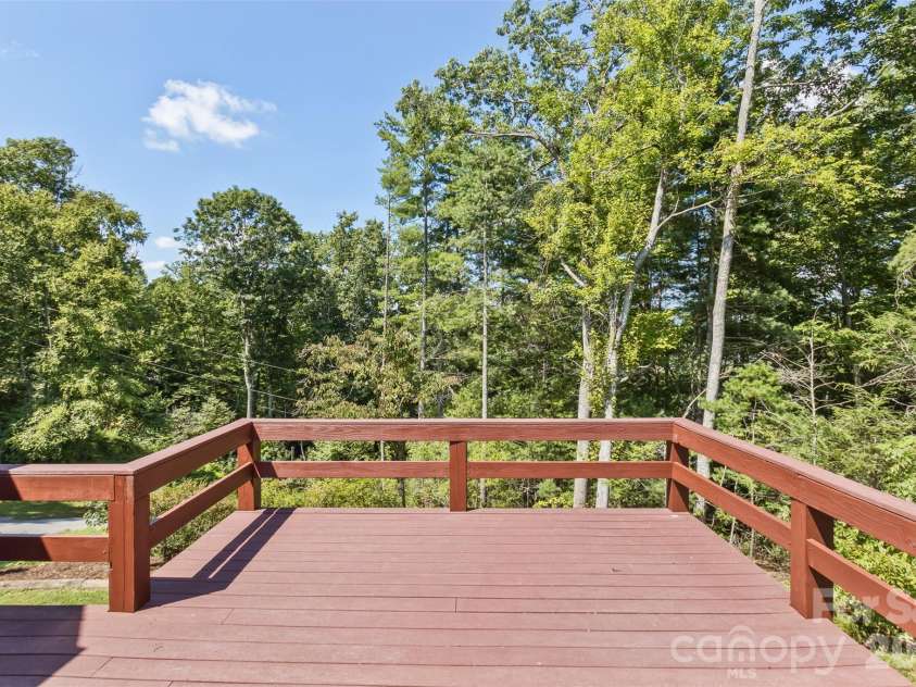 16 Spruce Way, Fairview, NC 28730.  MLS# CAR4421539, YatesRealty ID 49354. The deck space just keeps getting better and better!