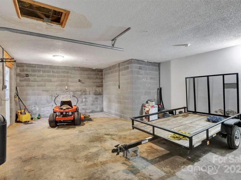 36014 Davis Drive, Albemarle, NC 28001.  MLS# CAR4311105, YatesRealty ID 4936. Garage side of basement