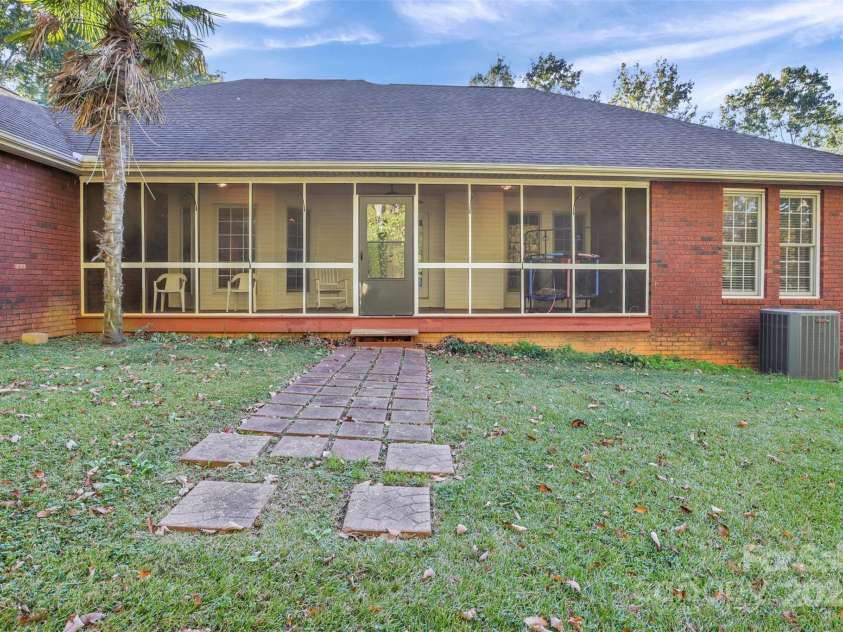 36014 Davis Drive, Albemarle, NC 28001.  MLS# CAR4311105, YatesRealty ID 4936. Screened in back porch