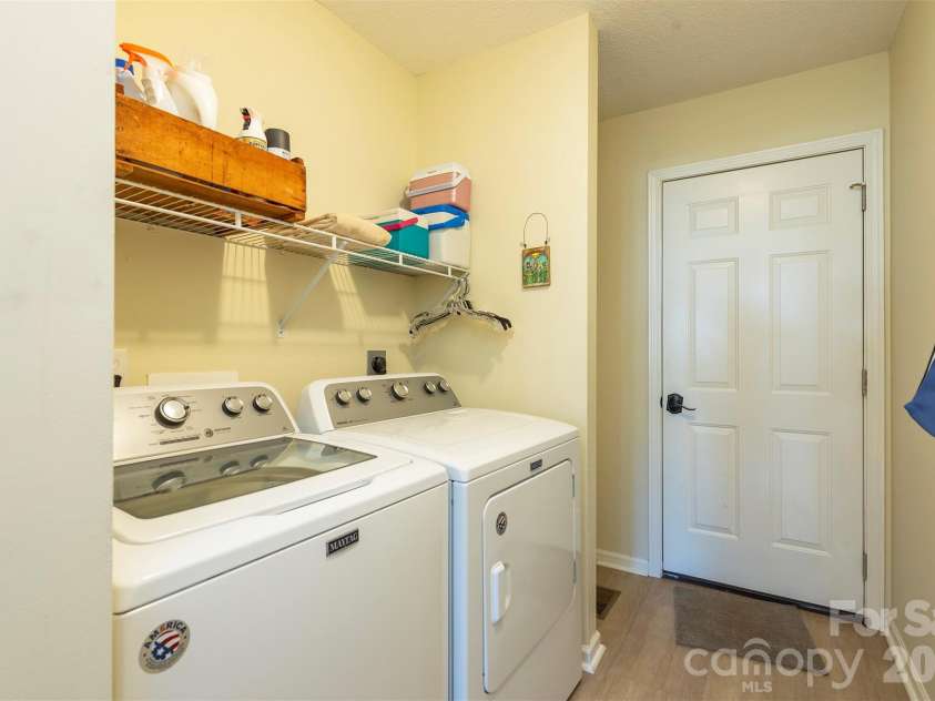 38 Eden Glen Road, Black Mountain, NC 28711.  MLS# CAR4421255, YatesRealty ID 49363. Laundry/mudroom with doors to garage and kitchen