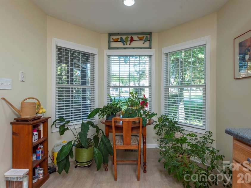 38 Eden Glen Road, Black Mountain, NC 28711.  MLS# CAR4421255, YatesRealty ID 49363. Sunny breakfast nook overlooking the yard