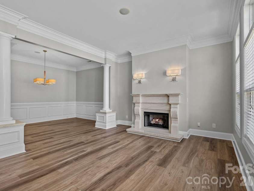 6415 Wakehurst Road, Charlotte, NC 28226.  MLS# CAR4420988, YatesRealty ID 49365. Living room into dining room