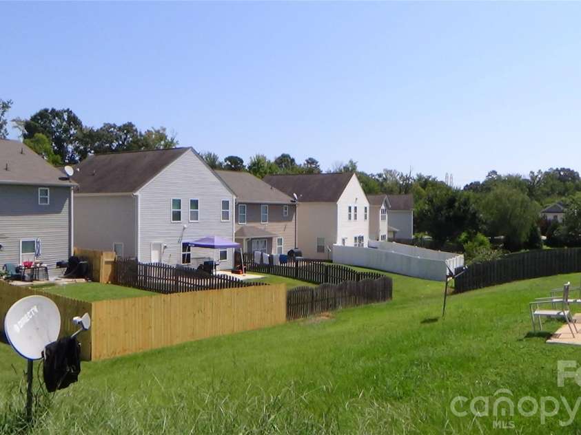 10738 Derryrush Drive, Charlotte, NC 28213.  MLS# CAR4421082, YatesRealty ID 49367. View from Back Yard