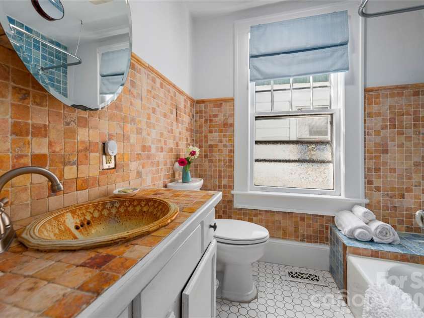 57 Conestee Street, Asheville, NC 28801.  MLS# CAR4419904, YatesRealty ID 49375. 