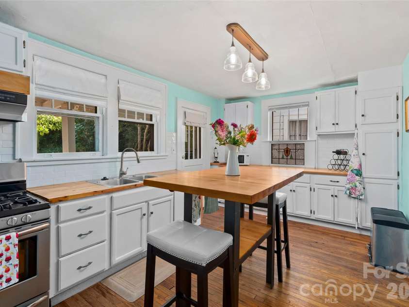 57 Conestee Street, Asheville, NC 28801.  MLS# CAR4419904, YatesRealty ID 49375. 