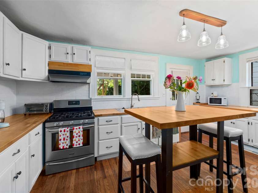 57 Conestee Street, Asheville, NC 28801.  MLS# CAR4419904, YatesRealty ID 49375. 