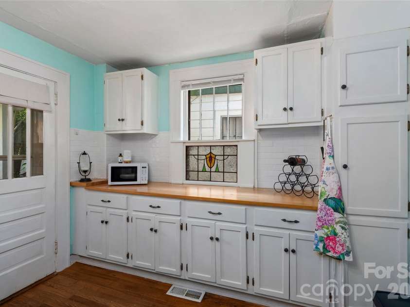 57 Conestee Street, Asheville, NC 28801.  MLS# CAR4419904, YatesRealty ID 49375. 