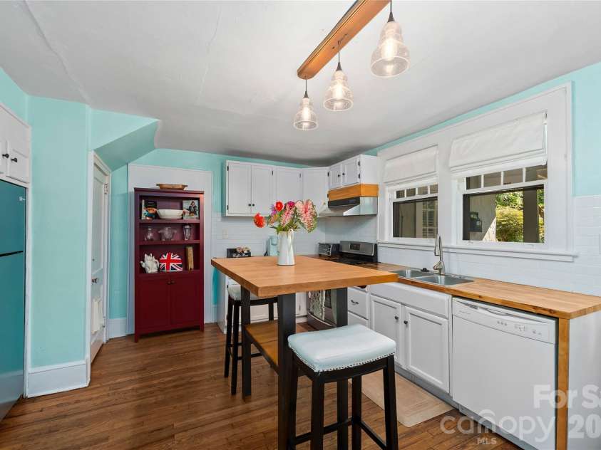 57 Conestee Street, Asheville, NC 28801.  MLS# CAR4419904, YatesRealty ID 49375. 