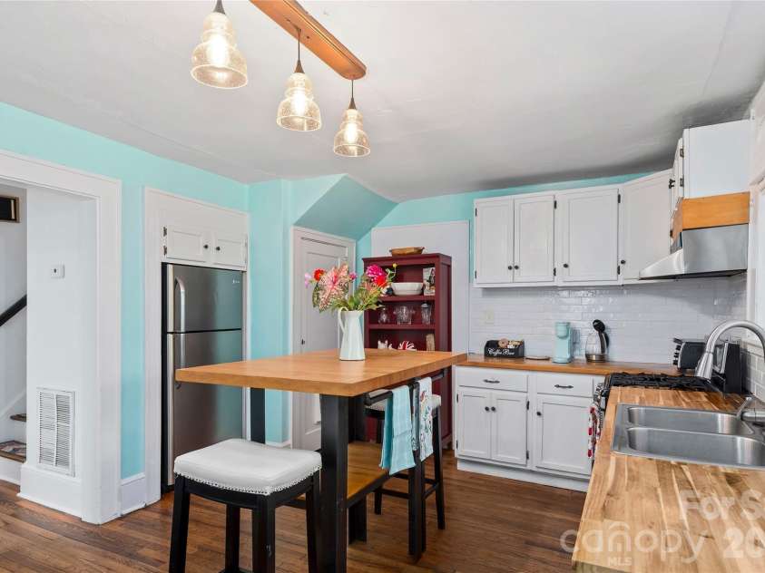 57 Conestee Street, Asheville, NC 28801.  MLS# CAR4419904, YatesRealty ID 49375. 