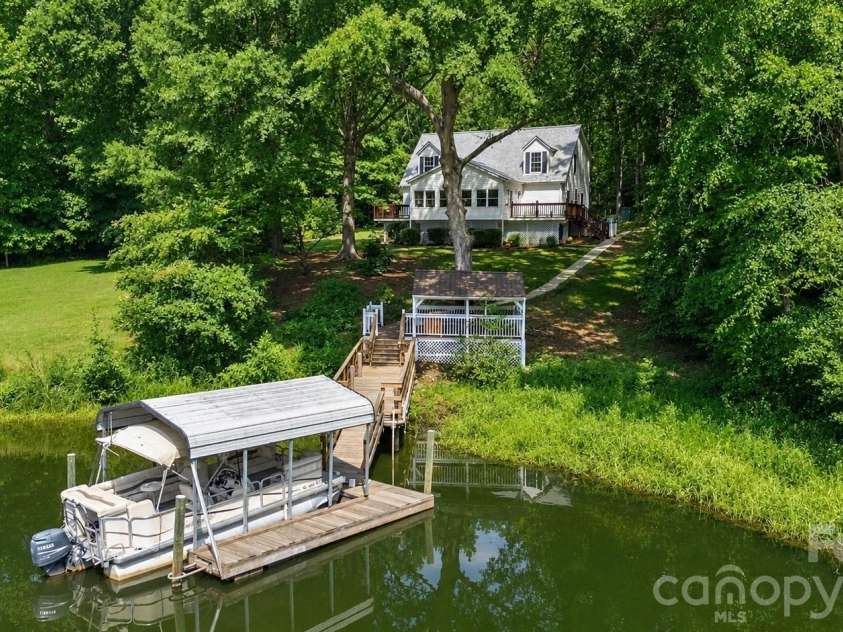 8137 Rowe Street, Catawba, NC 28609.  MLS# CAR4416052, YatesRealty ID 49383. Private waterfront retreat with deep water covered dock.
