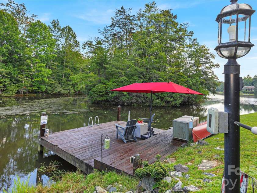 111 Kanunu Court, Brevard, NC 28712.  MLS# CAR4422371, YatesRealty ID 49387. The home's dock provides internet, electrical and a fish light