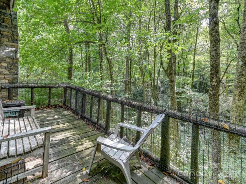 88 Chestnut Forest Road, Fairview, NC 28730.  MLS# CAR4171561, YatesRealty ID 494. Enjoy the surrounding nature from a variety of inviting spots throughout the property