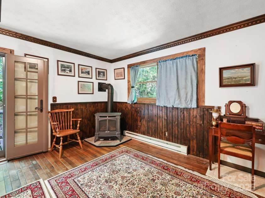 88 Chestnut Forest Road, Fairview, NC 28730.  MLS# CAR4171561, YatesRealty ID 494. Wood accents contribute to the warmness and appeal of the space