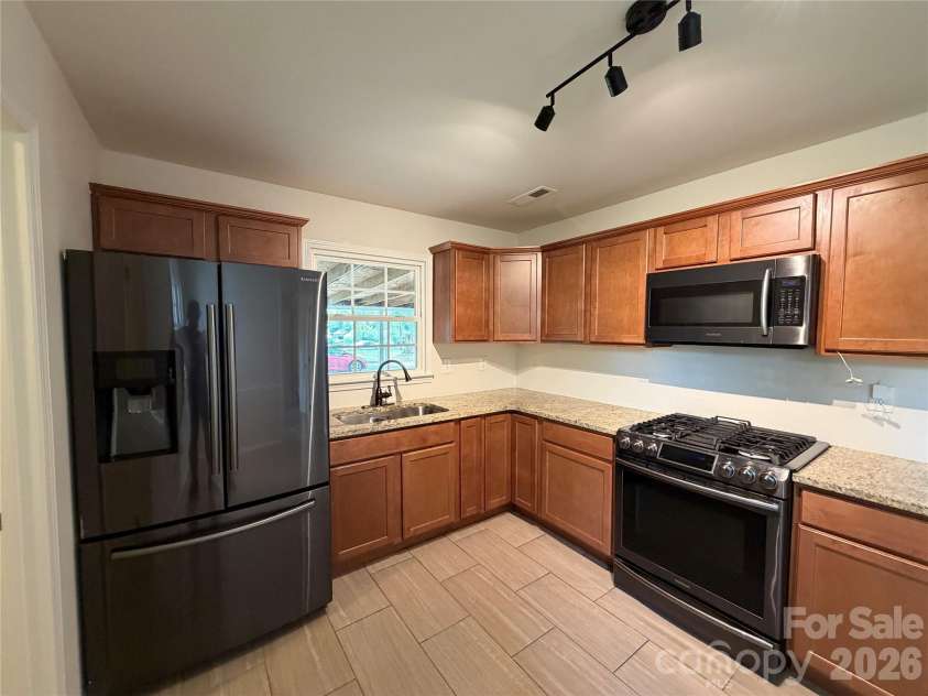 728 Milan Road, Charlotte, NC 28216.  MLS# CAR4422393, YatesRealty ID 49401. 